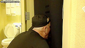 Gloryhole BJ DILF sucks cock with eager mouth near toilet